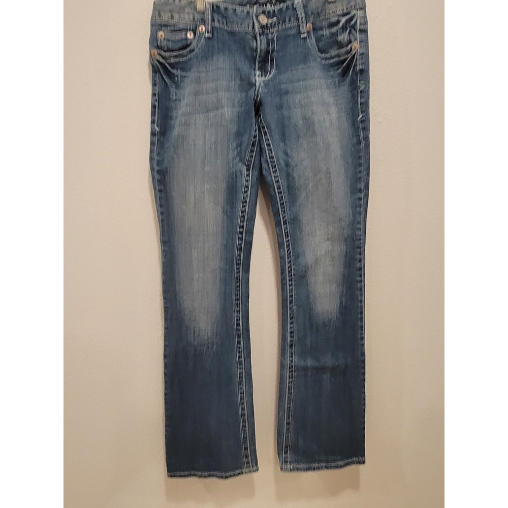 Maurices 7/8 long blue jeans rivet pockets flared bottoms distressed fronts
